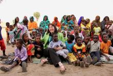 Virginia Gamba, the fourth Special Representative of the Secretary-General for Children and Armed Conflict, with children during a visit to South Kordofan, the Sudan. Photo: Fabienne Vinet, 2018.