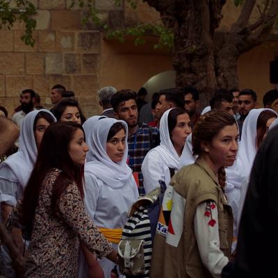 Pilgrims at a festival at Lalish in Dohuk Governorate, Kurdistan region of Iraq, on the day of the Yazidi New Year, 18 April 2017.  Levi Clancy, CC BY-SA 4.0, via Wikimedia Commons