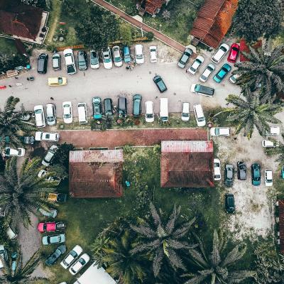 Houses and parked cars in Jerteh, Terengganu, Malaysia, 2020. Pok Rie