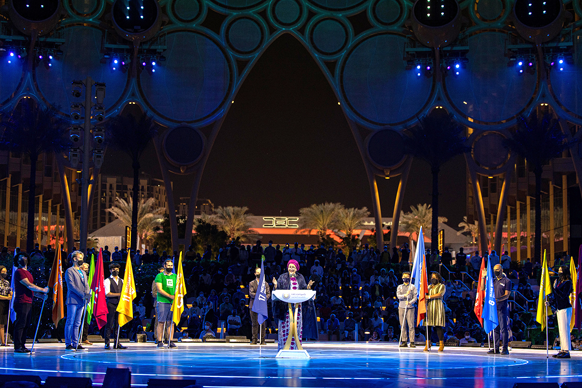 outside stage at night with speakers