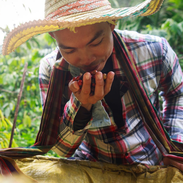 man holding fruits