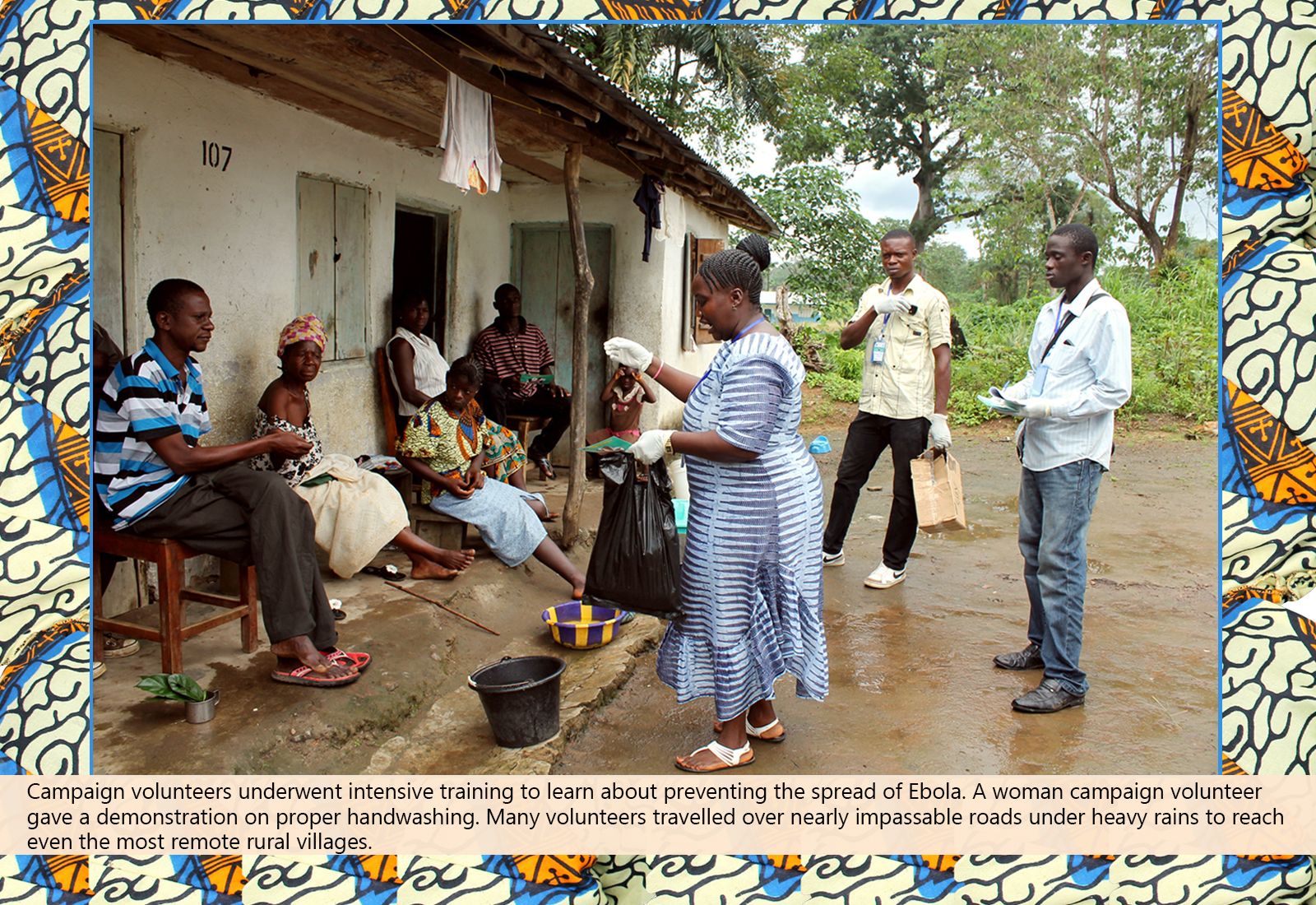 A woman campaign volunteer gives a demonstration on proper handwashing. 