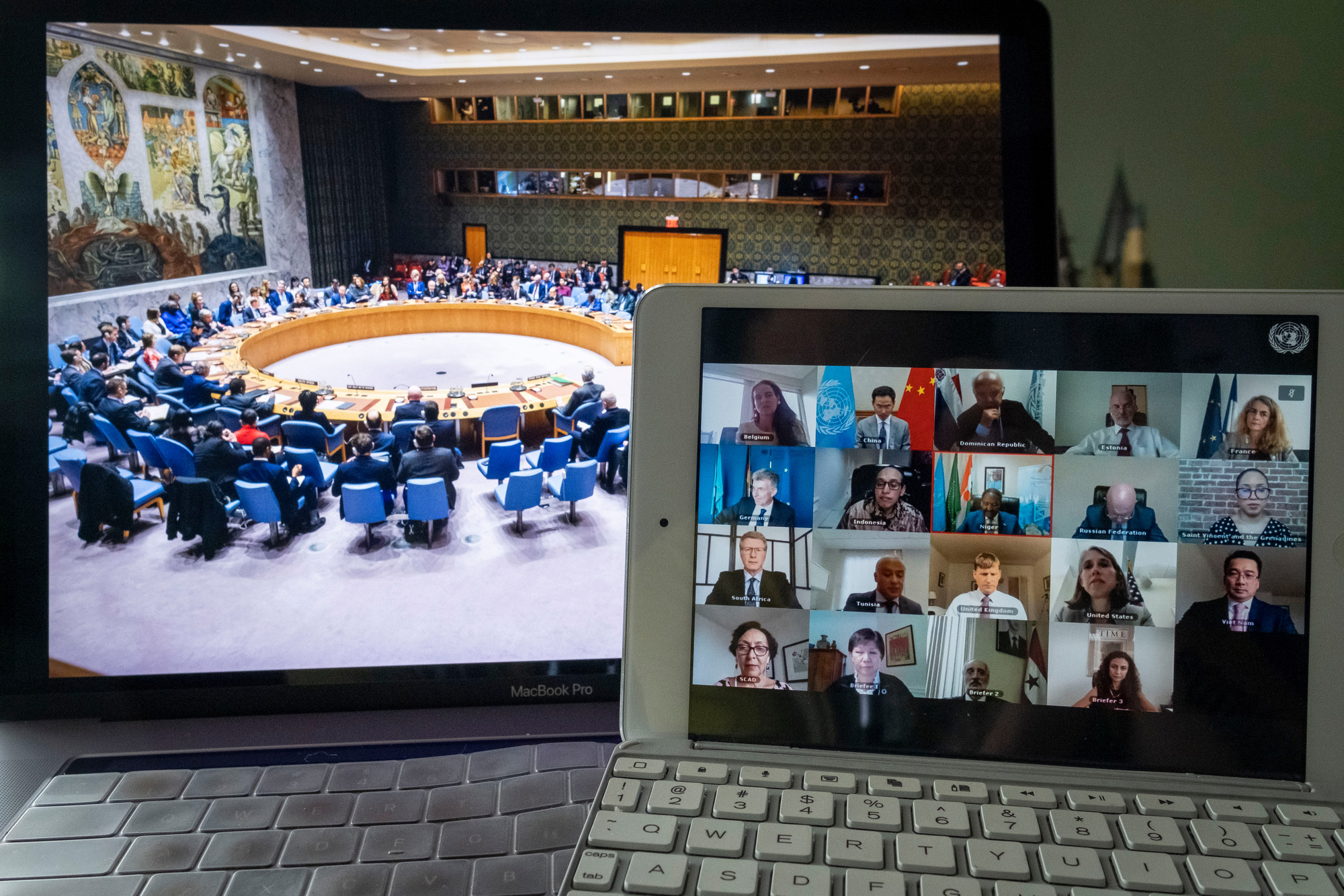 View of the Security Council from an interpreter's booth with a computer in the foreground