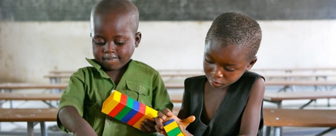 Children playing with toys at Shirichena Primary School, Mhondoro district, in Zimbabwe. Photo: UNICEF/Giacomo Pirozzi