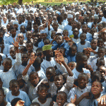 Boys listen to the lesson about the Global Goals.