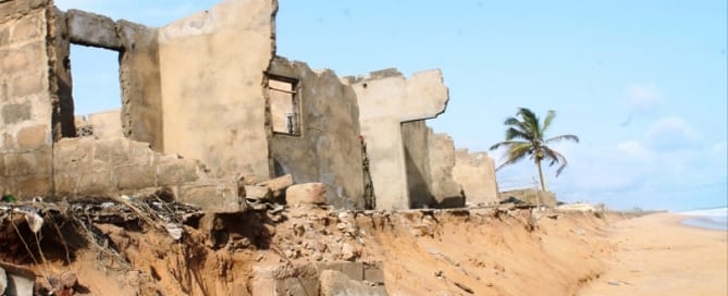 Photo: Rising sea levels, caused by climate change, are increasing eroding the coast of Togo and destroying home and businesses.