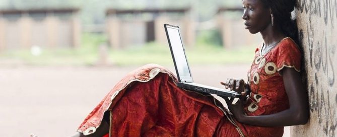 Photo: A woman uses a laptop computer.
