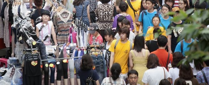 Photo: A throng of shoppers in Myungdong, downtown Seoul.