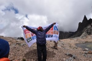 Photo: The Sustainable Development Goals flag waves on Mount Kenya.