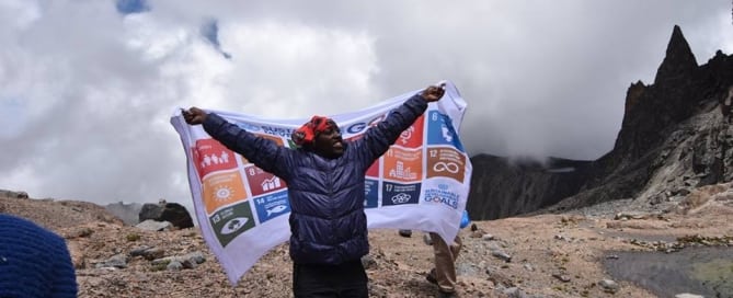 Photo: The Sustainable Development Goals flag waves on Mount Kenya.