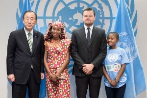 Photo: Mr. Ban poses with three of the speakers who addressed the opening segment of the signature ceremony. From left: Hindou Oumarou Ibrahim (from Chad), civil society representative; UN Messenger of Peace Leonardo DiCaprio; Getrude Clement, 16-year-old Tanzanian youth representative.