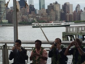 Photo: Under-Secretary-General Gyan Chandra Acharya, Palau President Tommy Remengesau, UN Secretary-General Ban Ki-moon and Hokule'a Master Navigator Nainoa Thompson drink a traditional Polynesian friendship drink.