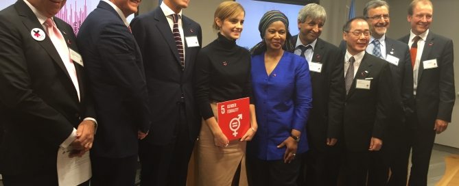 Photo: HeForShe Goodwill Ambassador Emma Watson (center) holds the Goal 5 Gender Equality icon next to UN Women Executive Director Phumzile Mlambo-Ngcuka and surrounded by the presidents of top universities.