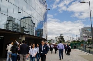 Photo: Habitat 3 participants walk past an event venue.