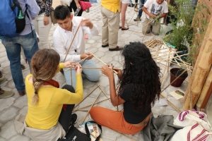 Photo: Young people participate in a contest about building with sustainable materials.