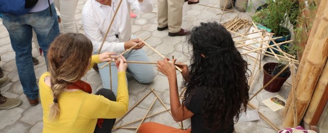 Photo: Young people participate in a contest about building with sustainable materials.