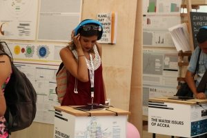 Photo: One attendee learns about water issues in the Exhibition Hall.