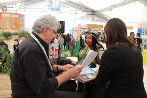 Photo: The German booth provides tables perfect for a quick meeting.