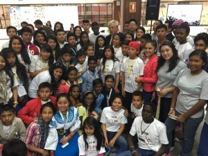 Photo: Joan Clos meets with kid attendees at Habitat 3.