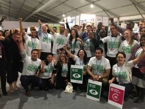 Photo: Young people show their climate action pride on Youth Day at COP22.