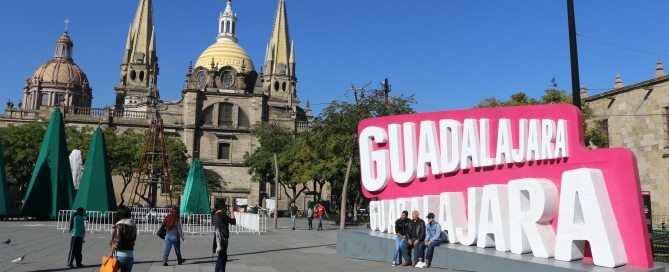 Photo: People walk on a plaza in Guadalajara''s central historic district.