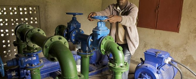 A technician releases water