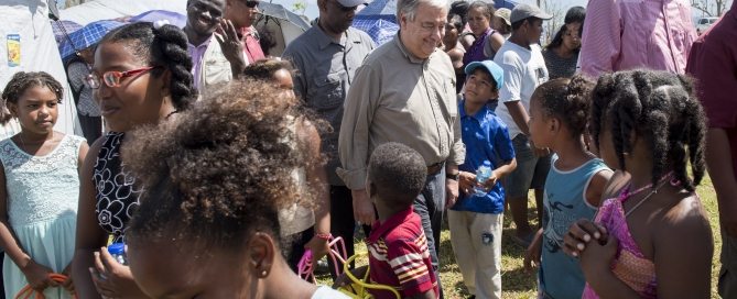 Photo: Secretary-General António Guterres greets people in Dominica on 8 October 2017.