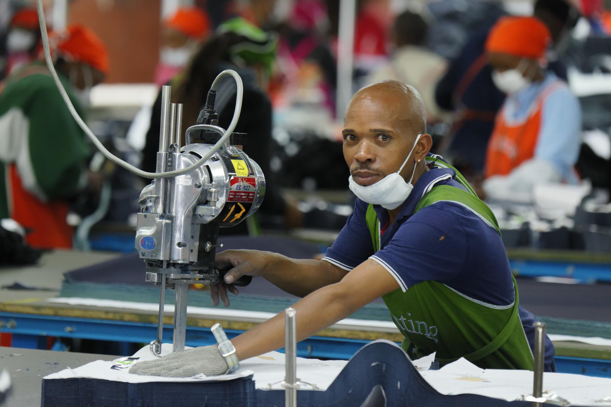 A cutting operator works in the factory in Lesotho.