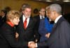 Mr. Kofi Annan, Brazilian President Luis Inacio Lula Da Silva, and his wife Mariza