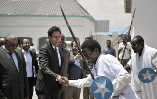 Envoy on Youth, Ahmed Alhendawi, is greeted at the Ministry of Youth by Somali dancers in Mogadishu