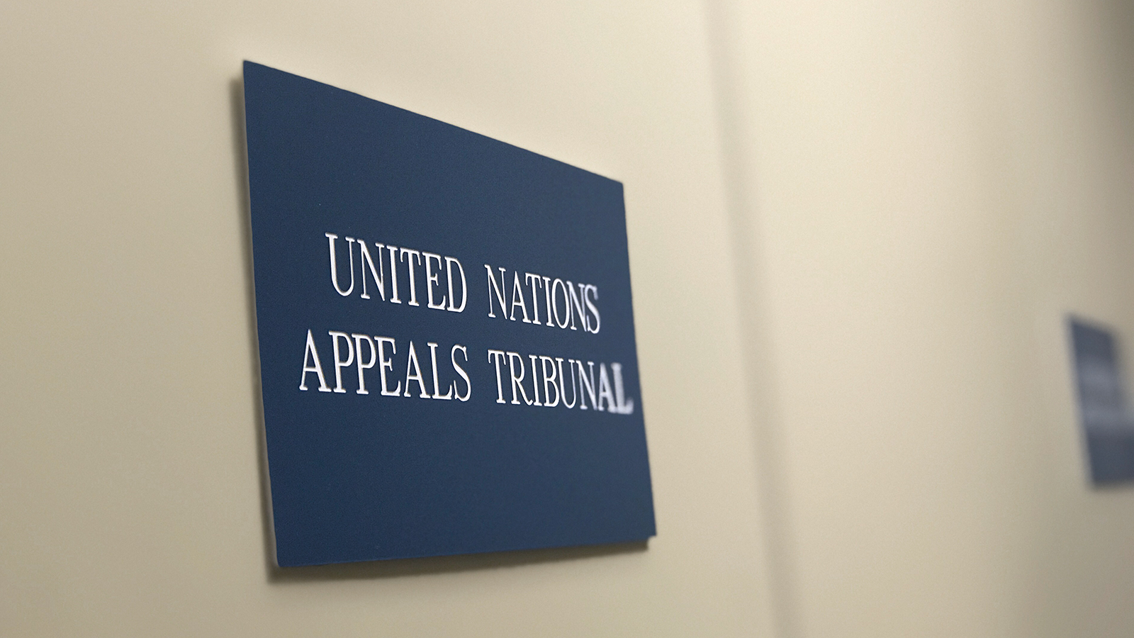 Photo of UN Appeals Tribunal sign outside the offices of their Registry in New York.