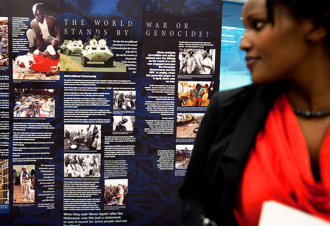 A woman looks at an exhibit on the 1994 genocide in Rwanda displayed in Geneva.